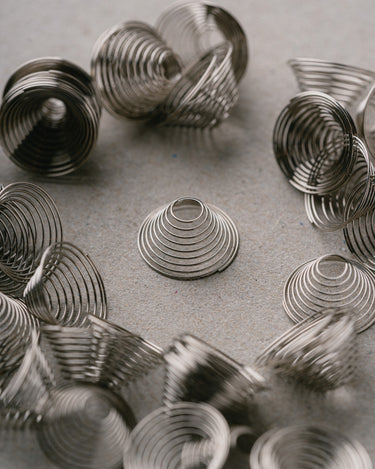 DynaCap™ Conical Springs
